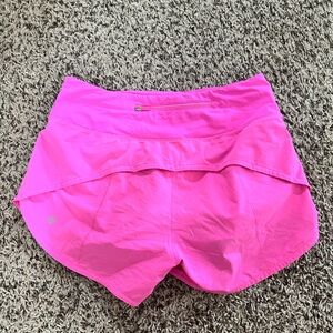 lululemon sonic pink , size 6, 4’ inseam
